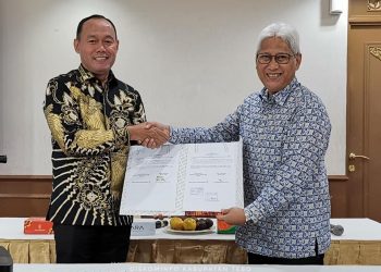 Bupati Sukandar Tandatangani MoU dan PKS Layanan Informasi Publik