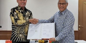 Bupati Sukandar Tandatangani MoU dan PKS Layanan Informasi Publik
