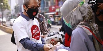 KPK Gelar Kampanye Antikorupsi Dengan Bagikan Masker Kepada Masyarakat