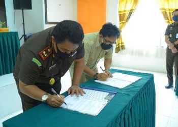 Kejari Batanghari dan Diskoperindag Tandatangani MoU Bidang Hukum