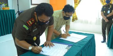 Kejari Batanghari dan Diskoperindag Tandatangani MoU Bidang Hukum