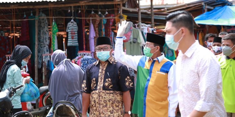 Warga Bukit Sari Bersatu Memenangkan Fachrori-Syafril