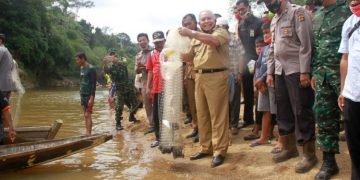 Bupati Safrial Mulai kegiatan Panen Ikan Sungai Lubuk Larangan Raja Gagak Dusun Mudo