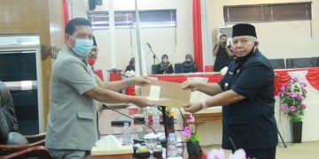 Bupati Safrial Sampaikan Nota Pengantar Ranperda Penegakan Protokol Kesehatan