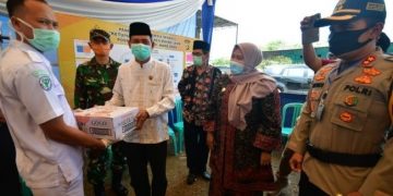 Bupati Masnah Kunjungi Poskotis Idul Fitri 2020