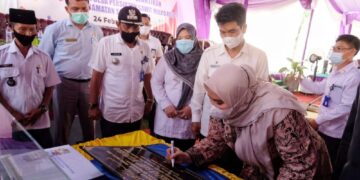 Bupati Masnah Resmikan Desa Sawit Mulyo Rejo Kec. Sungai Gelam