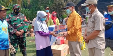 Bupati Merangin Serahkan  Bantuan Kepada Korban Kebakaran di Desa Bukit Bungkul