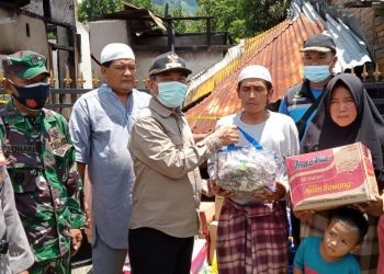 Bupati H Mashuri Serahkan Bantuan Kepada Korban Kebakaran di Desa Bukit Perentak