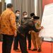 Hadiri Rakor  Bersama KPK, Bupati Merangin Tandatangani Komitmen Anti Korupsi