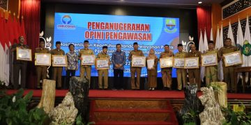 Ketua Ombudsman RI Serahkan Rapor Penilaian Pelayanan Publik ke Pemda se-Provinsi Jambi