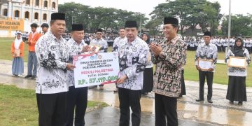 Pj Bupati Merangin Sebagai Inspektur Upacara Peringatan HUT PGRI  dan Hari Guru 2023