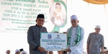 Staf Ahli Bidang Pemerintahan Hadiri Haul Akbar Sulthanul Aulia Syekh Abdul Qadir Al Jailani di Desa Kempas Jaya