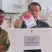 Pj Bupati Merangin Nyoblos Pemilu 2024 di TPS 05 Pulau Kemang