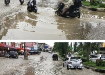 Diguyur Hujan Sebentar,  Jalan Tiga Jalur di Depan Pertokoan Idaman Kabupaten Merangin Kembali Terendam Air