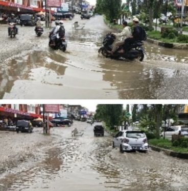 Diguyur Hujan Sebentar,  Jalan Tiga Jalur di Depan Pertokoan Idaman Kabupaten Merangin Kembali Terendam Air
