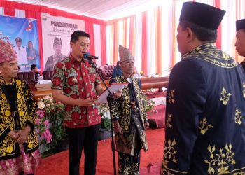Pj Bupati Muaro Jambi Hadiri Pengukuhan LAM Desa, Kepala Desa Tanjung Dan Desa Panca Mulia