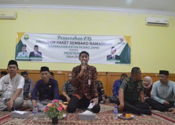 Pj Bupati Hadiri Acara Penyerahan Program Paket Sembako Ramadhan BAZNAS Kabupaten Muaro Jambi