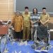 Bupati Anwar Sadat Berikan Sepeda Baru dan Kursi Roda untuk Pedagang Kecil dan Penyandang Disabilitas