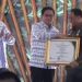 Pj Bupati Merangin Terima Penghargaan dari Menteri Desa PDTT