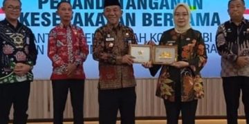 Pj Bupati Merangin Tandatangani MoU dengan Pemkot Jambi Tentang Pengembangan Pembangunan Potensi Daerah
