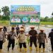 Bupati M. Syukur Dampingi Gubernur Al Haris Tanam Padi dan Salurkan Bantuan BiosCF ISFL di Desa Seling